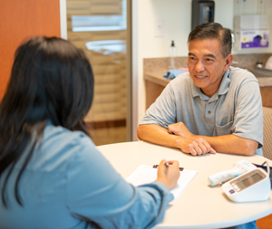 Clinical Research Associate with a patient